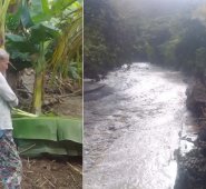 Las familias afectadas inspeccionan los daños en sus cultivos. El muro de contención del sector La Curva en el corregimiento Pueblo Nuevo quedó destruido. Cortesía