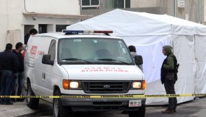 El asesinato múltiple ocurrió en una zona residencial de clase media baja y entre las víctimas hay familiares y amigos. AFP