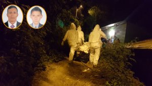 El CTI de la Fiscalía practicó la inspección y el levantamiento de los cadáveres de los familiares. El cuerpo de Juan Pablo Martínez (izquierda) quedó tendido a un costado de la carretera. Cristian Herrera