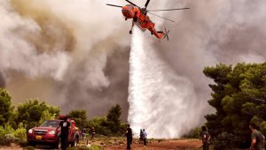 El balance en la zona arrasada supera los 77 muertos registrados en los incendios de 1977 en el y la isla de Eubea. AFP