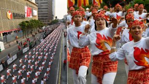Alineados, hombres y mujeres vestidos de rojo y blanco bailaron en el centro de la capital a ritmo de ‘Poco poco’, una danza originaria de la región de Manado. AFP