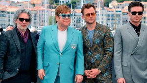 El cineasta canadiense David Furnish, el director británico Dexter Fletcher, el cantante y compositor británico Elton John, el actor británico Taron Egerton y el actor británico Richard Madden. AFP