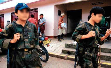 Aunque las Farc aseguran que en sus filas tienen solo a 21 menores de 15 años, en Colombia la realidad es que no existe una cifra oficial de cuántos niños, niñas y adolescentes han sido reclutados para la guerra. Archivo