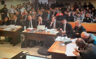 Los uniformados continúan vinculados al crimen del docente y el patrullero, hechos ocurridos en agosto de 2013 en Cali. Colprensa