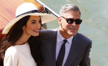 George Clooney y su esposa Amal. AFP
