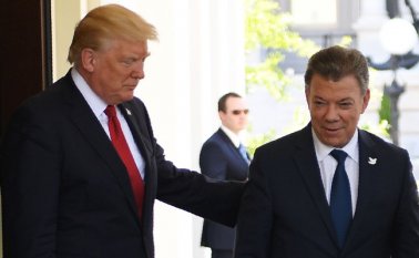 Donald Trump y Juan Manuel Santos. AFP