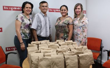 Colaboradores de la empresa Positiva. La Opinión