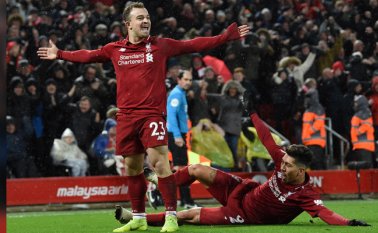 Xherdan Shaqiri y Roberto Firmino. Archivo