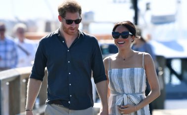 Príncipe Enrique de Inglaterra y su esposa Meghan Markle. AFP