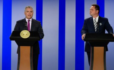 El jefe de la Misión de Verificación de la ONU, Carlos Ruiz (derecha), junto al presidente Iván Duque. Colprensa