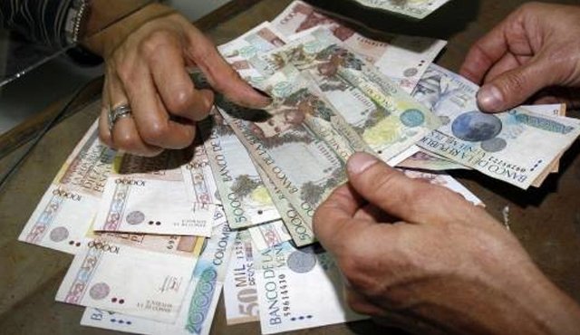 El ingreso mínimo mensual de los colombianos sería de $689.954. Archivo
