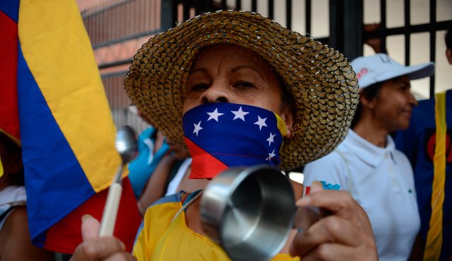 Hasta hace unos años, los venezolanos que llegaban tenían también nacionalidad española o sus papeles migratorios en regla. AFP