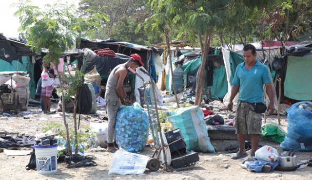 Las personas que habitan en Ciudad de Dios ganan su sustento reciclando materiales.
César Obando