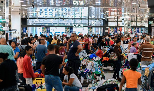Las tensiones entre potencias, la distribución de la riqueza mundial, la digitalización de las empresas y los nuevos impuestos que ayudarán a combatir el cambio climático son los temas que dominarán la economía mundial en 2020. AFP