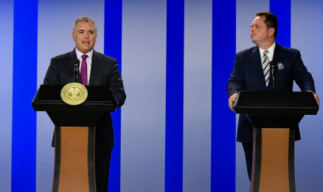 El jefe de la Misión de Verificación de la ONU, Carlos Ruiz (derecha), junto al presidente Iván Duque. Colprensa