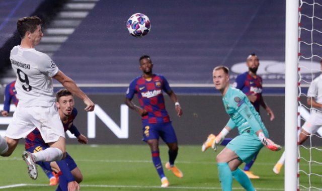 El Bayern Múnich y su goleador robert lewandowski (izq) esperan en semifinales al ganador del duelo entre Manchester City y Lyon. El goleador polaco lidera la tabla de artilleros en esta edición de la Champions, con 14 tantos. AFP